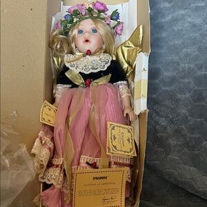 Porcelain Doll with Pink Dress and Floral Crown